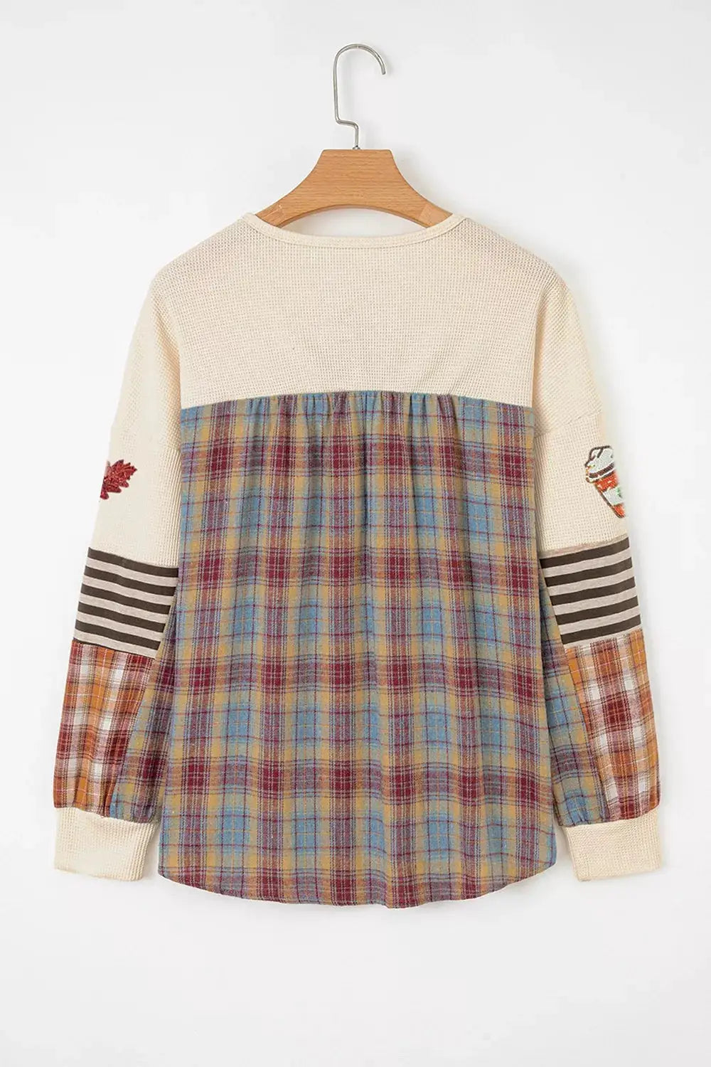 Sequin Autumn Leaf & Coffee Cup Waffle Knit Top; cream upper with plaid color-block and leaf/coffee cup patches on sleeves