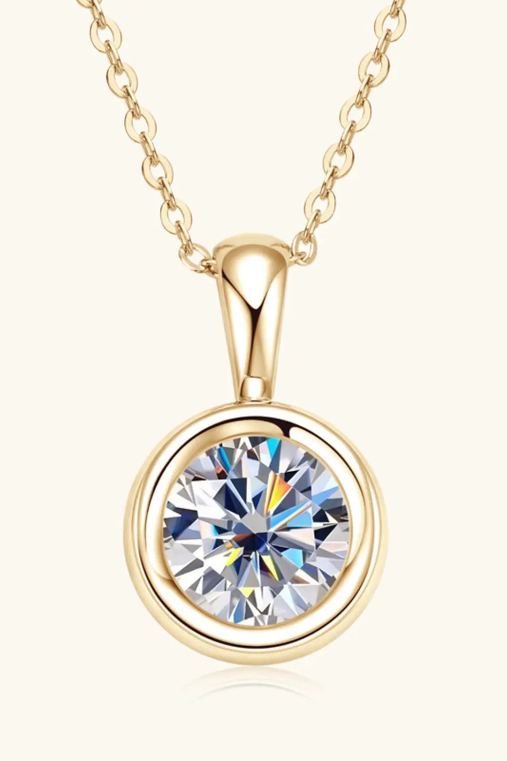 Gold-tone moissanite pendant necklace with a large round center stone on a link chain