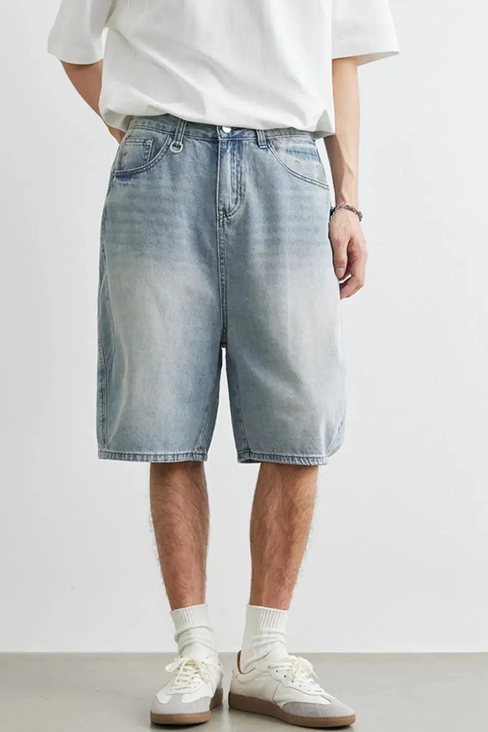 Mens Plus Size Relaxed Fit Stretch Washed Denim Shorts in light blue with classic five-pocket styling