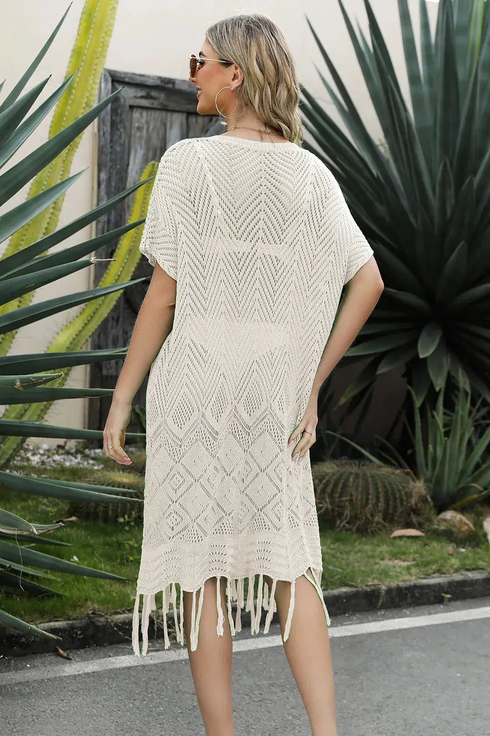 Lightweight eyelet fringe longline knit beach cover up in cream by Trendsi.