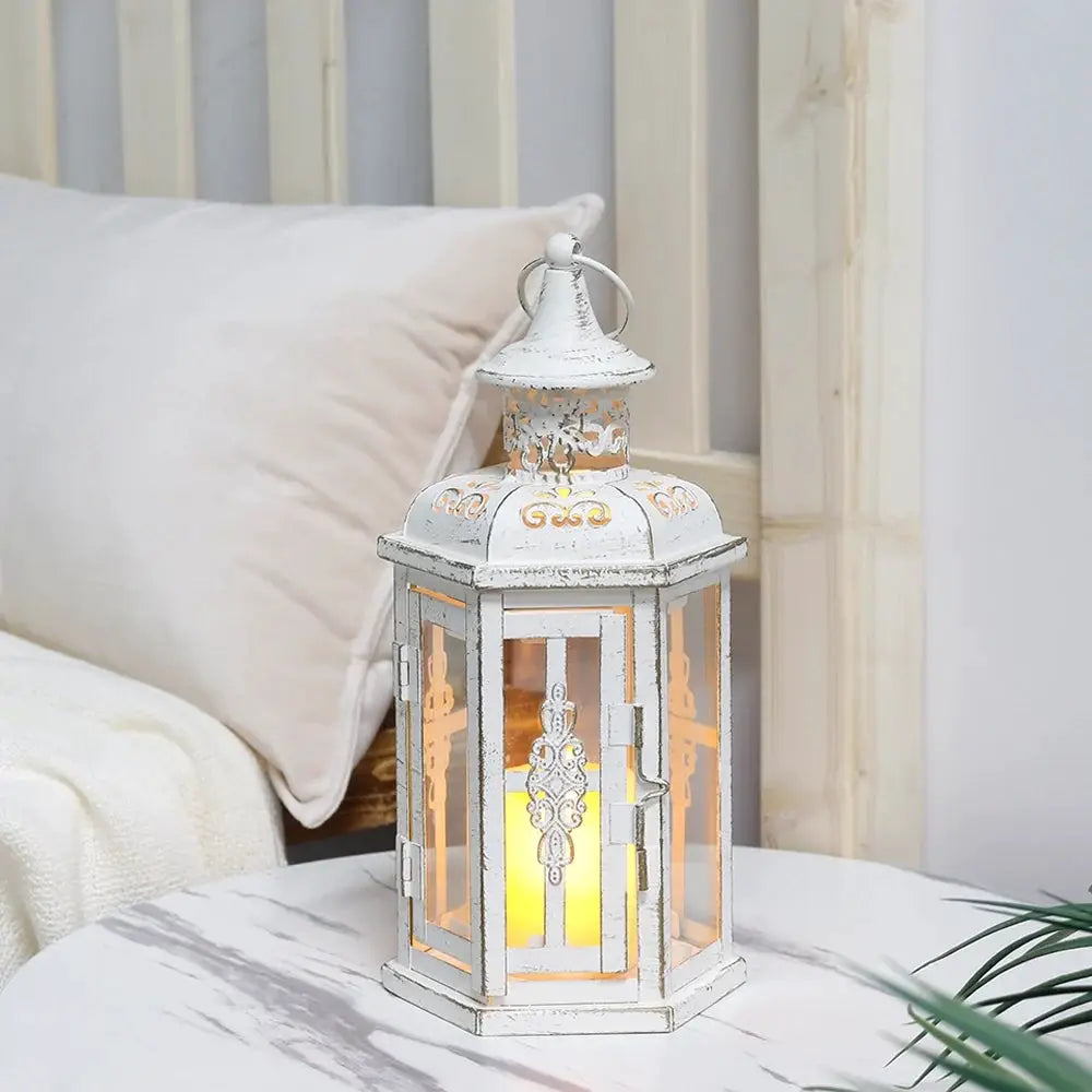 10-inch vintage-style hanging lantern candleholder, white distressed metal with glass panels and warm candle glow