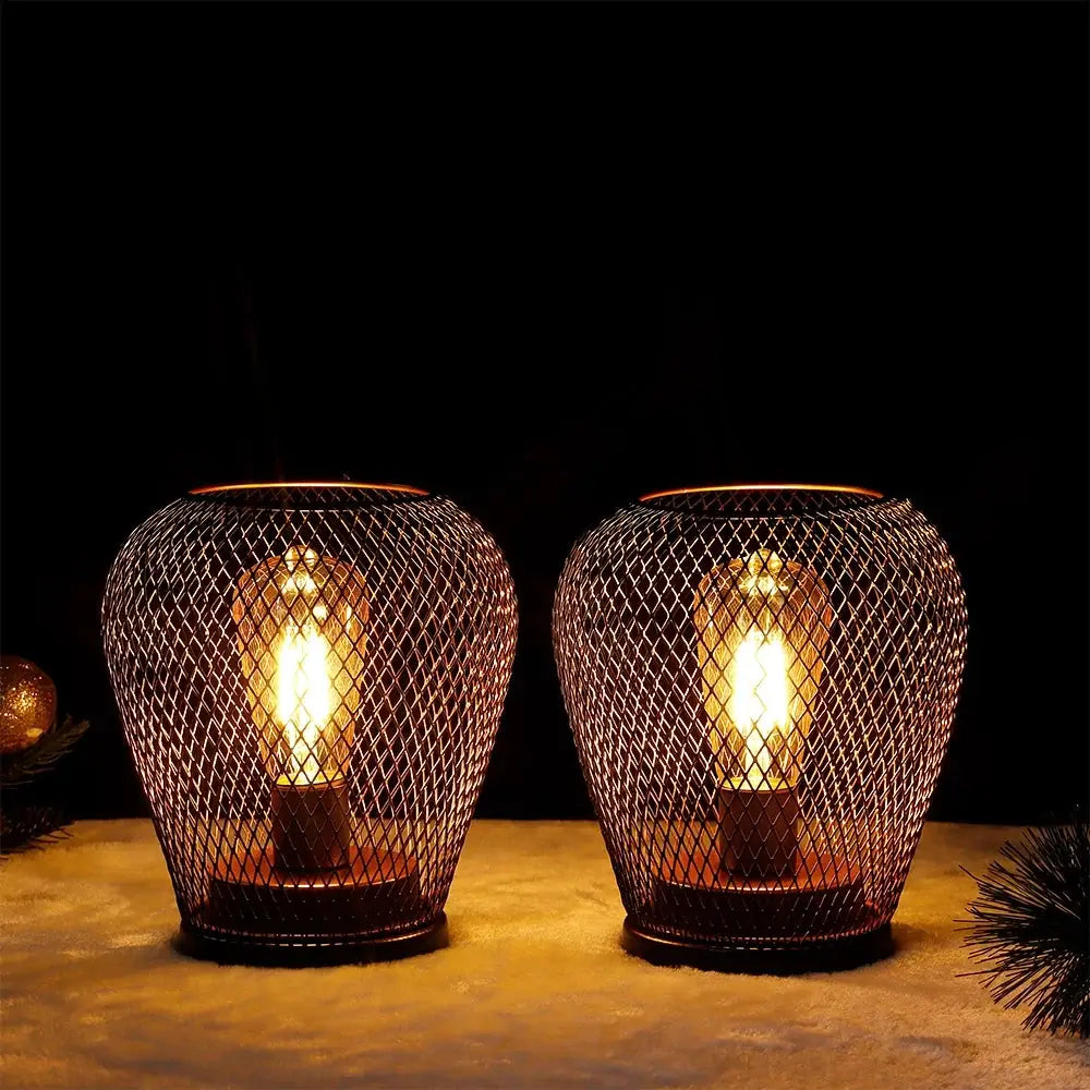 6.7-inch tall battery-powered outdoor table lamp set (2) with bronze wire-mesh cages and warm Edison bulbs