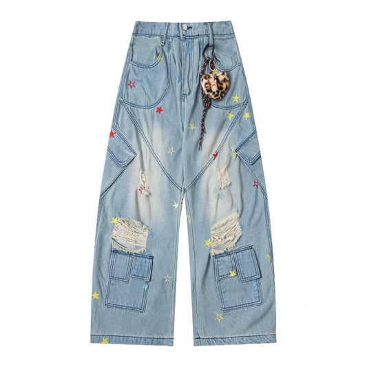 Jeans brodés à couteau incurvé