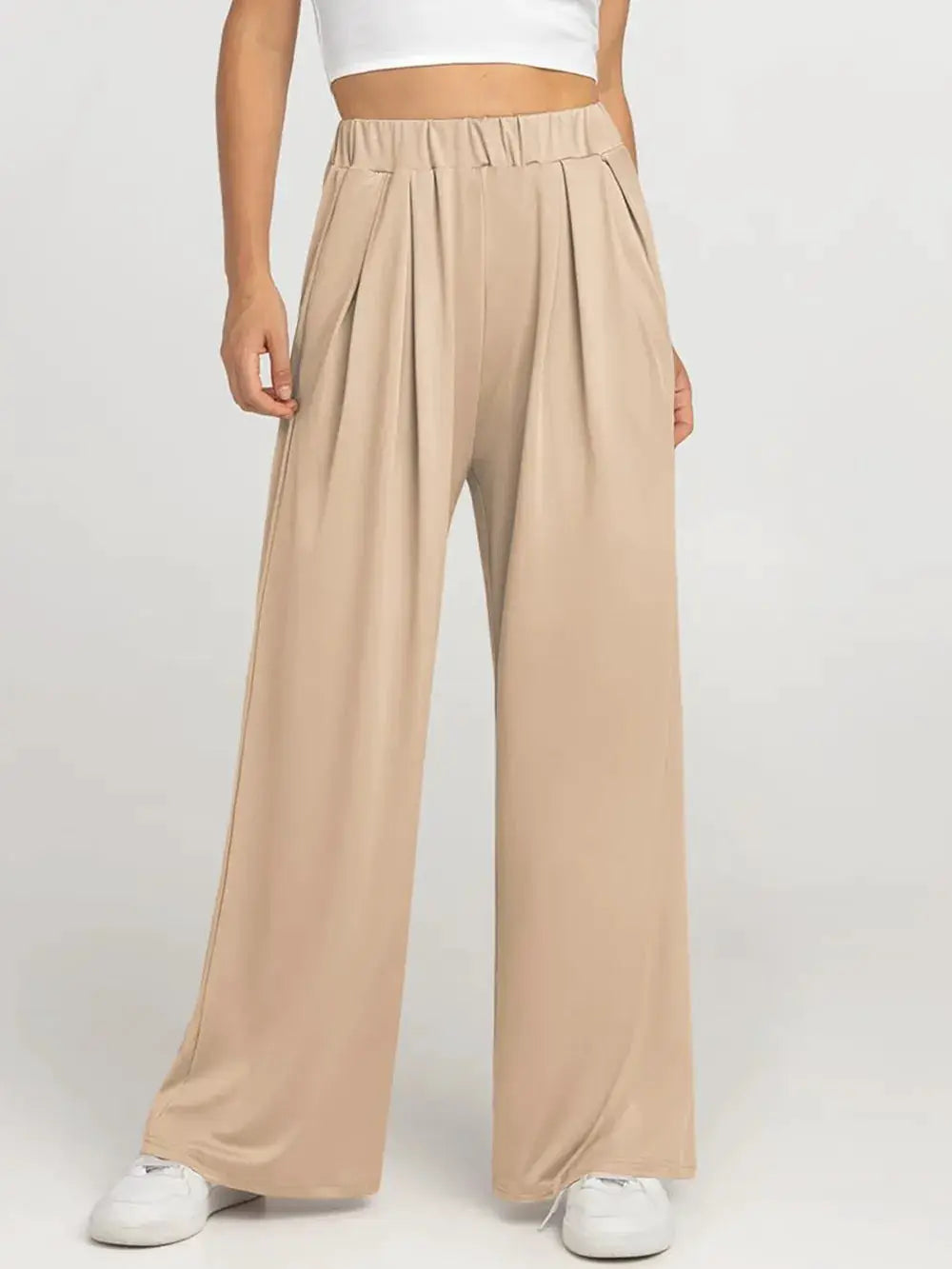 Elastic Waist Wide Leg Pants beige Palazzo pants by Trendsi with elastic waistband and flowy drape.