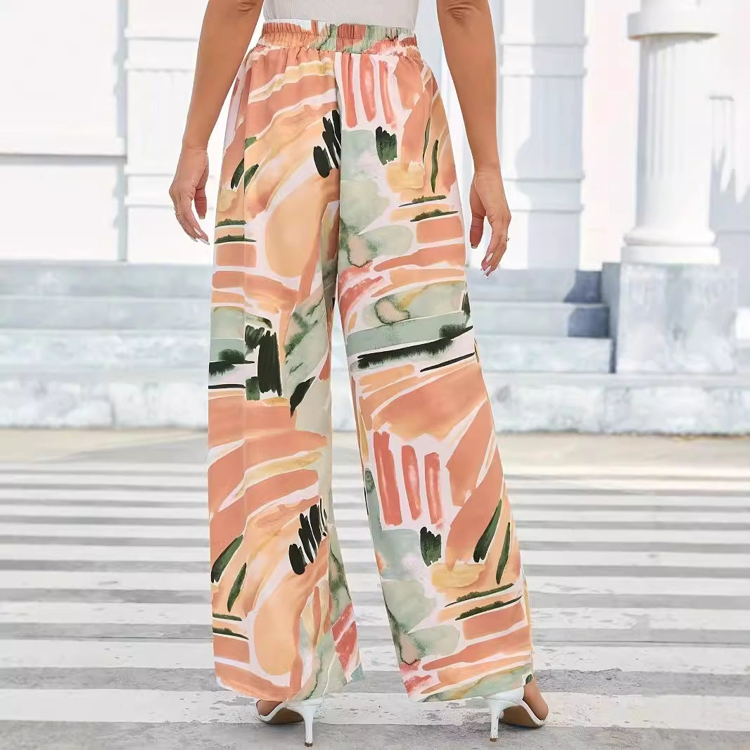 Elastic waist wide-leg pants by eprolo in peach-green abstract print, casual trousers