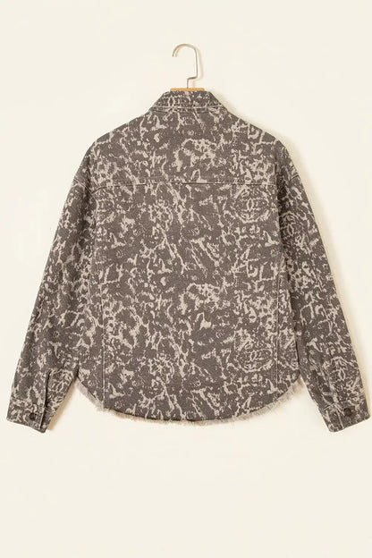 Abstract print long-sleeve denim jacket with a raw hem in grey-black wash