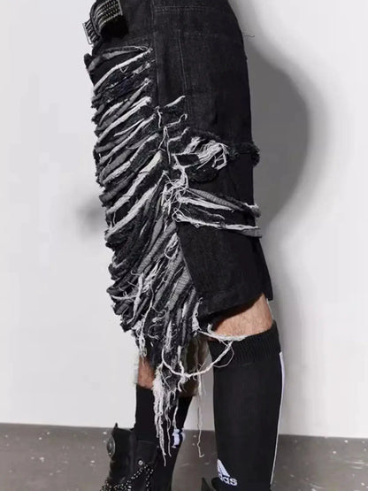 Men's black denim shorts with frayed hems and white fringe along the sides.