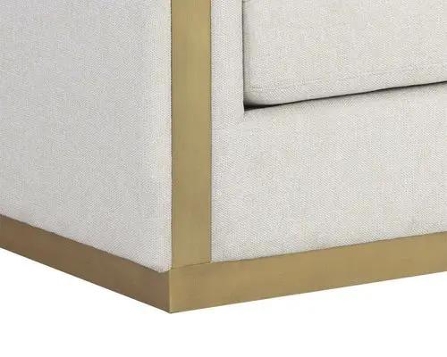 Lean Sofa Belfast Oatmeal with beige upholstery and gold-toned metal frame.