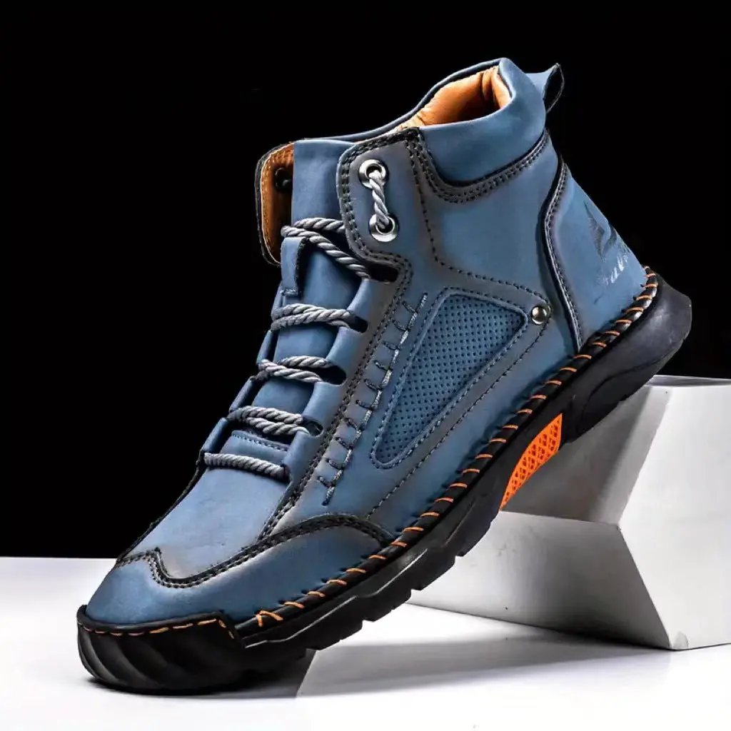 Aveline Handcrafted Ankle Boots by AdTec in blue leather with comfort flat heel, lace-up design and rugged sole.