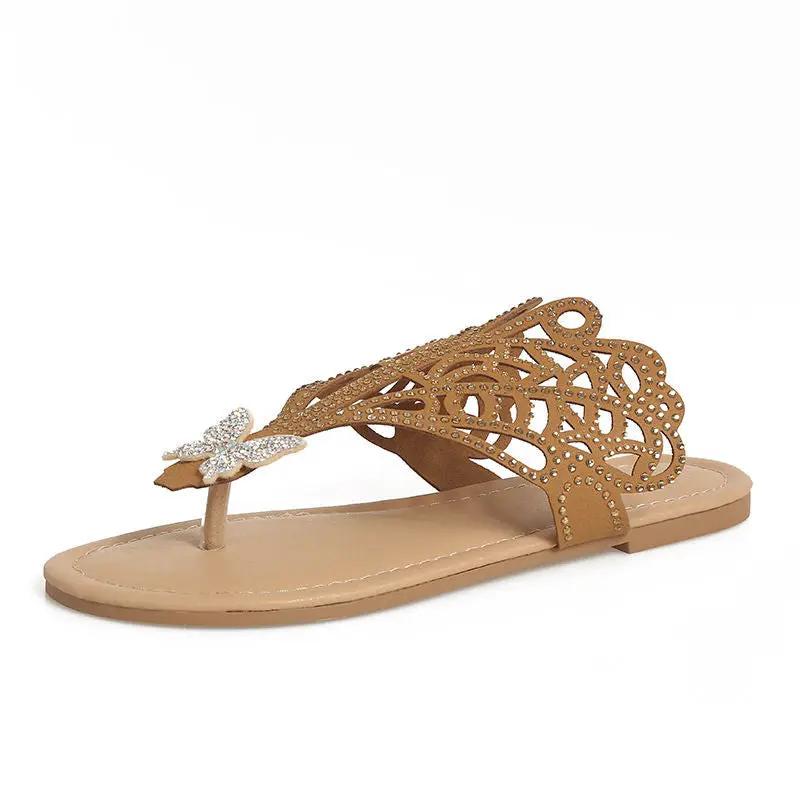 AdTec women's slip-on flip-toe sandal with rhinestone flower embellishment, tan hollow cutout upper, flat sole