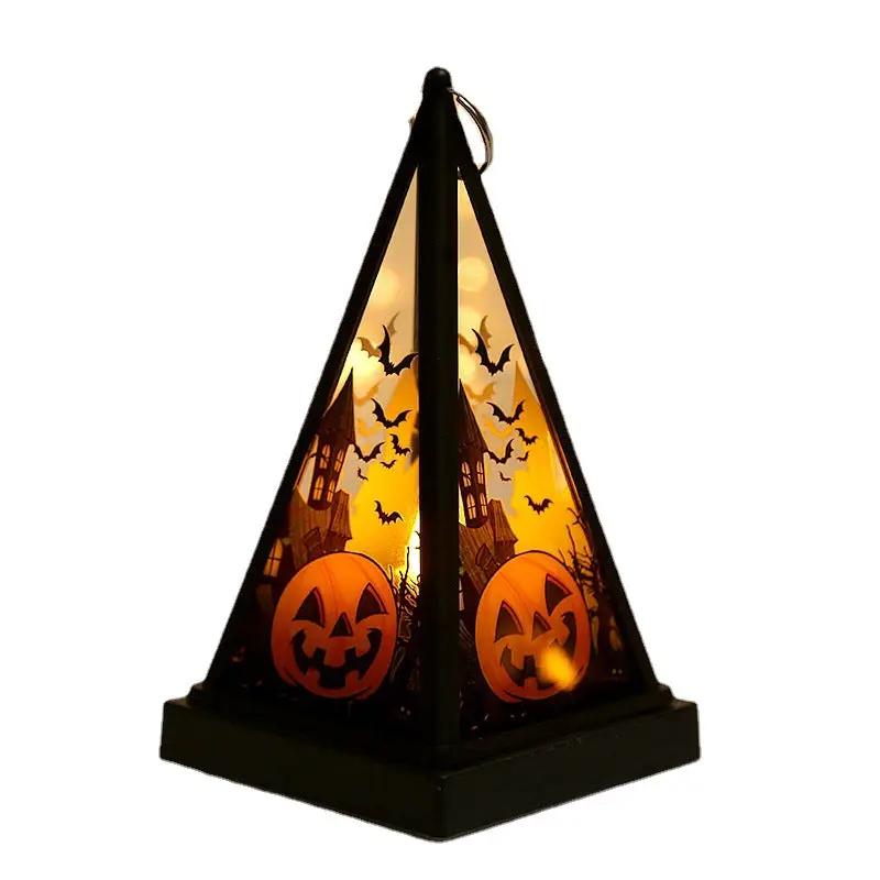 Halloween pumpkin lantern nightlight with bat silhouettes and haunted house, warm orange glow