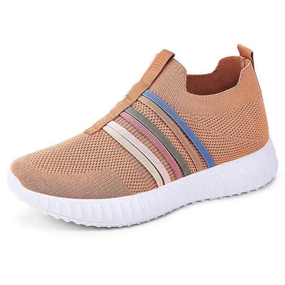 Women's casual breathable mesh sneakers by AdTec with peach knit upper, multicolor side stripes, and white sole