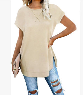 Blusa de mujer de color liso con cuello redondo y hombros caídos