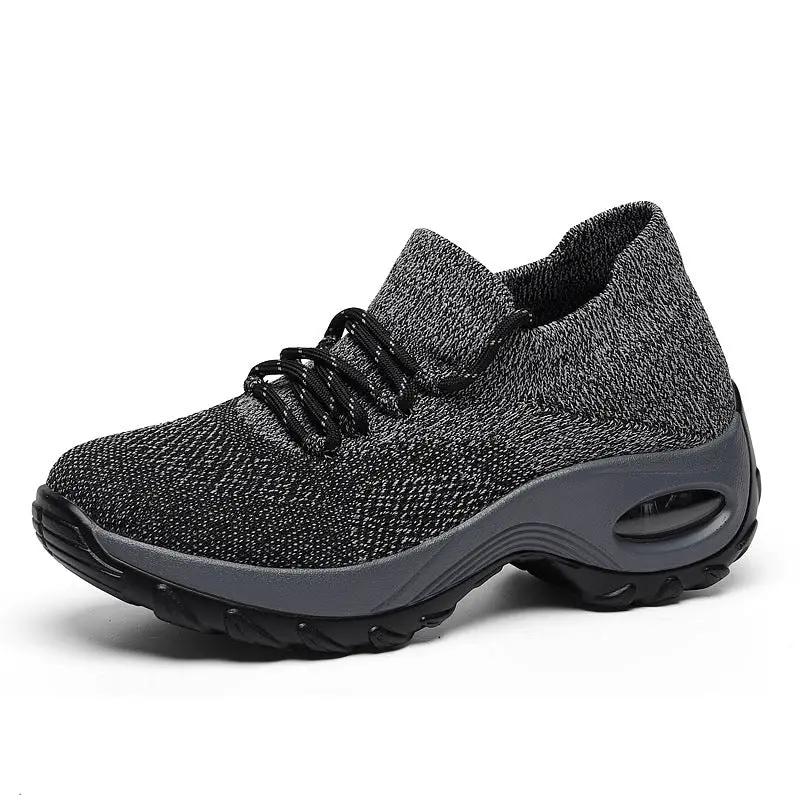 AdTec women's knit running shoe with gray/black knit upper and chunky sole