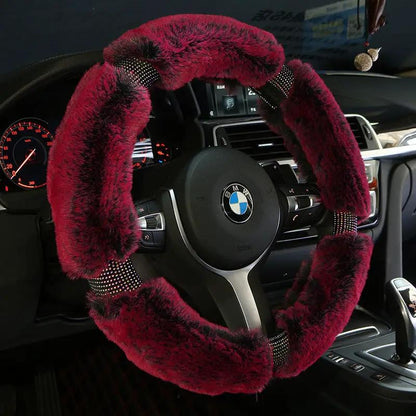 Red plush steering wheel cover with diamond-accents and studded bands