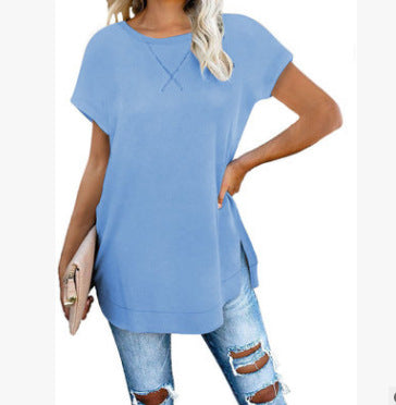 Blusa de mujer de color liso con cuello redondo y hombros caídos