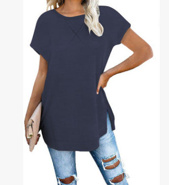 Blusa de mujer de color liso con cuello redondo y hombros caídos