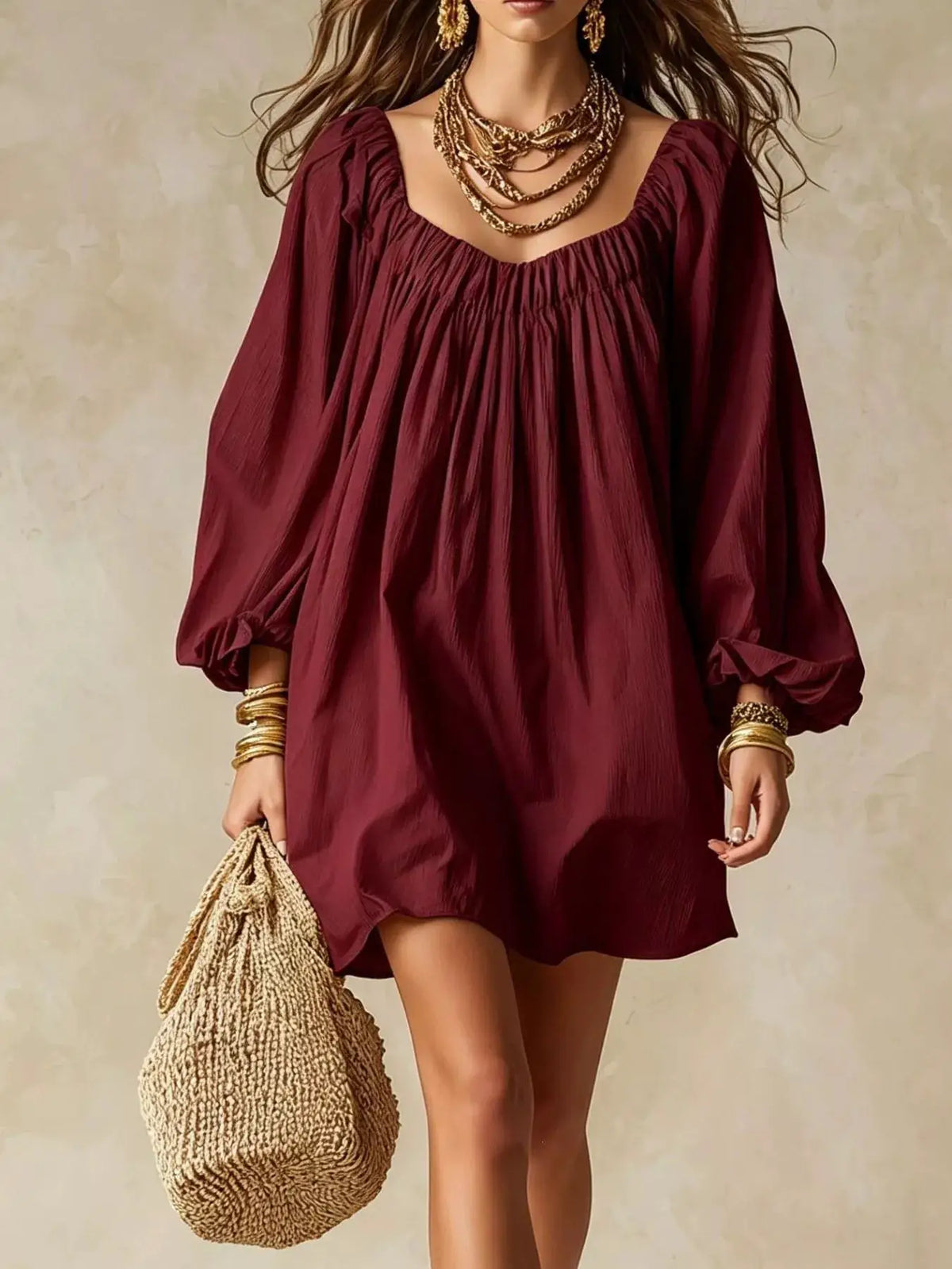 Flowy Balloon Sleeve Mini Dress in burgundy by Trendsi; paired with layered gold jewelry and a woven bag