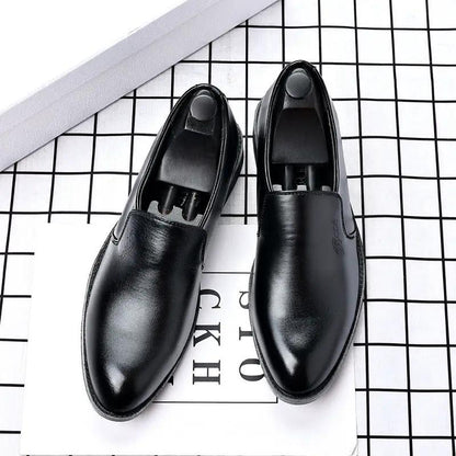 Pair of men's casual business slip-on leather shoes with pointed toe by AdTec, black