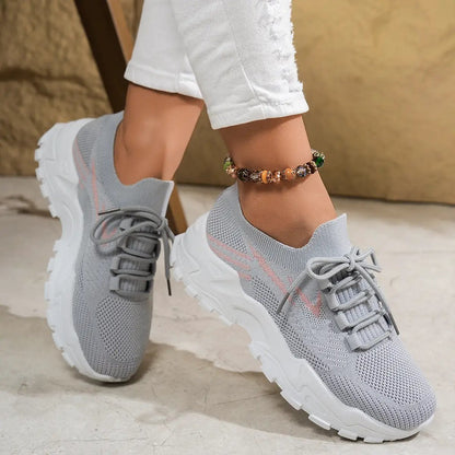Women's casual lightweight knit sports shoes by AdTec in gray with a white chunky sole
