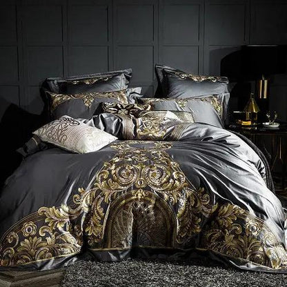Embroidered quilt cover bedding set in dark gray with gold ornate pattern and matching pillow shams