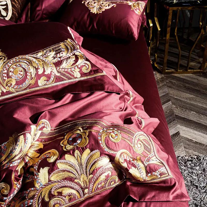Embroidered Chinese cotton quilt cover set in burgundy with gold floral patterns by AdTec.