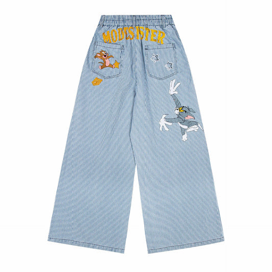 Pantalones vaqueros con diseño deconstruido, a rayas, con paneles y costuras curvas, y efecto lavado