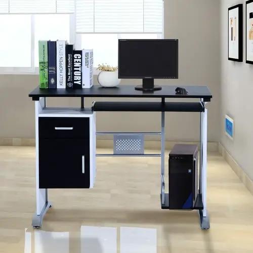 HOMCOM computer desk with black top and silver frame; monitor on top, CPU tower underneath, and books on the left.