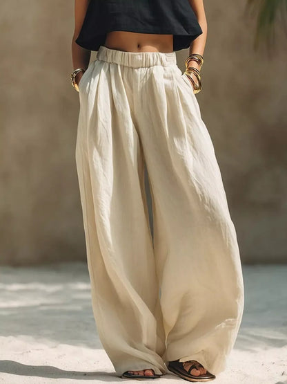 Plus-size palazzo pants with elastic waistband, drawstring and pockets in beige