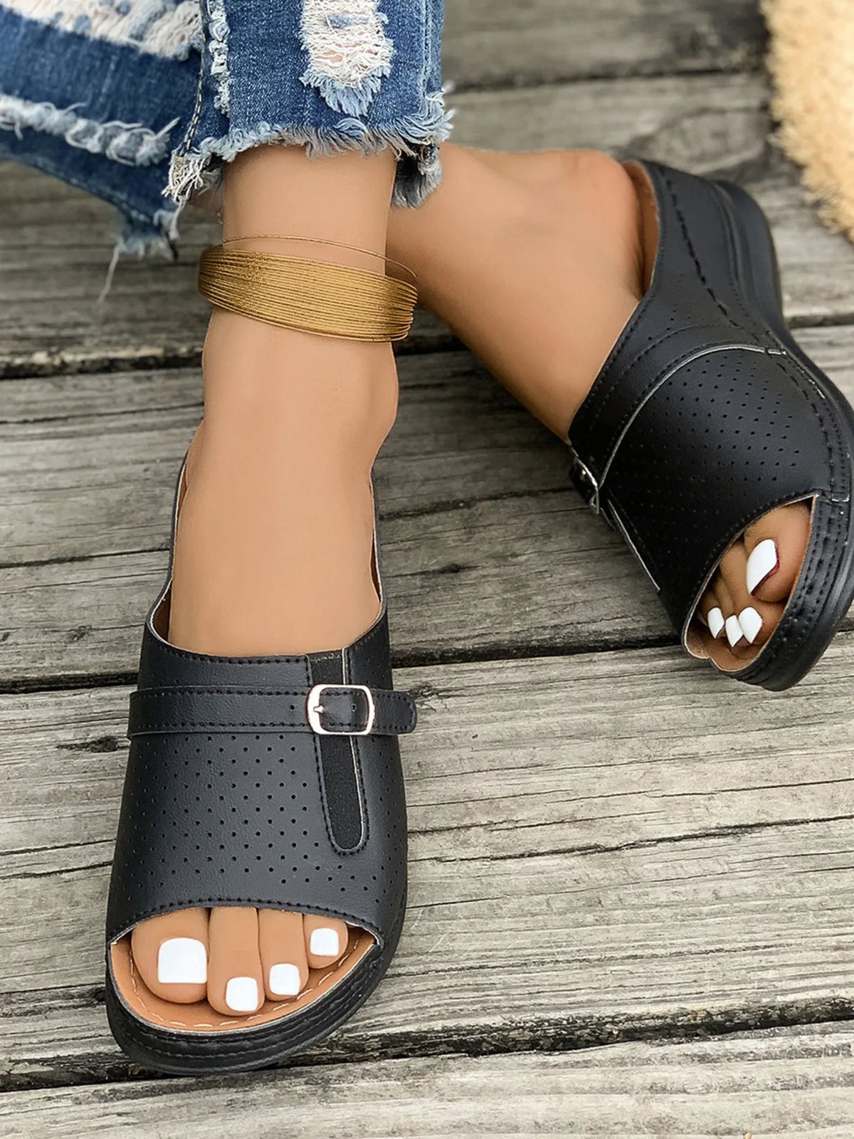 Casual Comfort Buckle Strap Sandals in black perforated faux leather with ankle buckle.