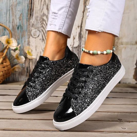 Plus size sequined lace-up sneakers in black with patent toe cap and white rubber sole