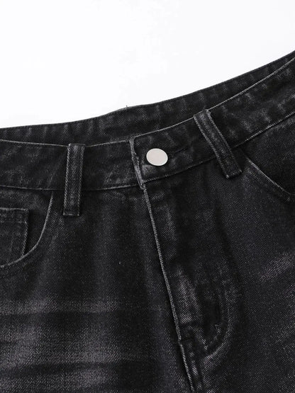 Mens distressed black denim shorts waistband with belt loop, metal button and front pocket detail