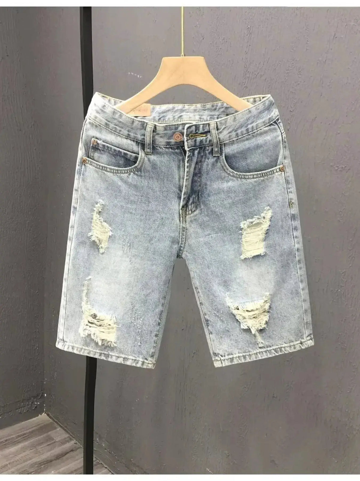 Men's relaxed distressed washed cotton denim shorts, light wash with ripped knees