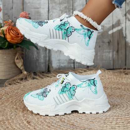 Butterfly-print mesh sneakers, white casual athletic shoes with chunky soles; two sneakers shown