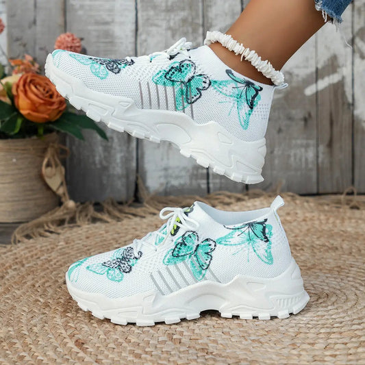 Butterfly-print mesh sneakers, white casual athletic shoes with chunky soles; two sneakers shown