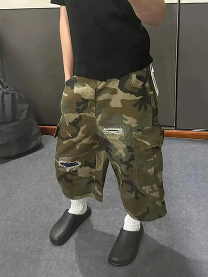Mens plus-size camo cargo denim shorts with distressed patches by Trendsi