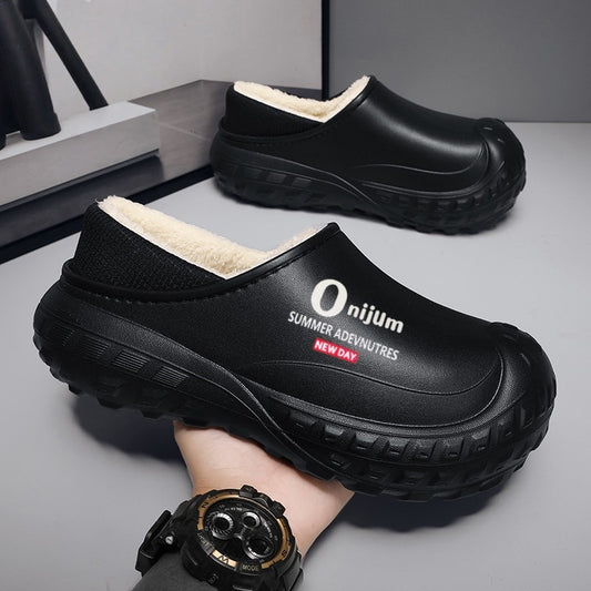 Men's black fleece-lined home slippers pair with anti-slip sole, synthetic leather upper, AdTec.