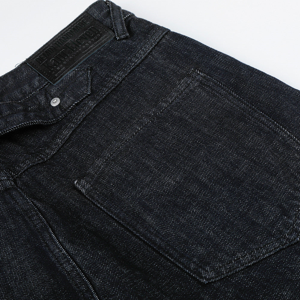 Pantalon patte d'éléphant en jean de couleur unie