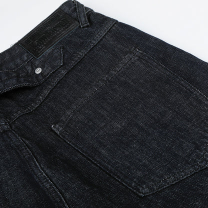 Pantalon patte d'éléphant en jean de couleur unie