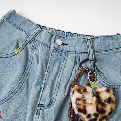 Embroidered curved knife jeans