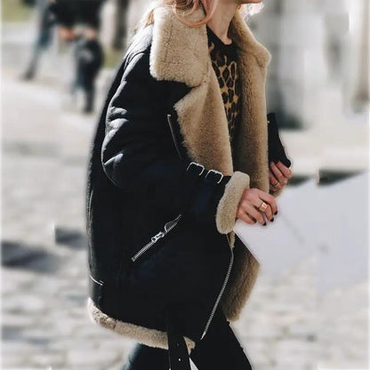 Suede leather jacket with tan lamb wool lining and black exterior