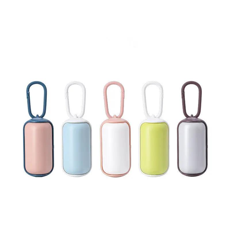 Portable poop bag dispenser set of 5 in assorted colors by AdTec