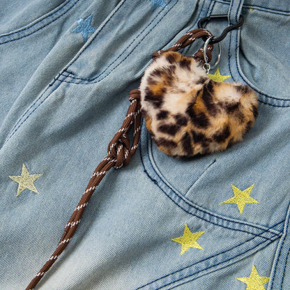 Embroidered curved knife jeans