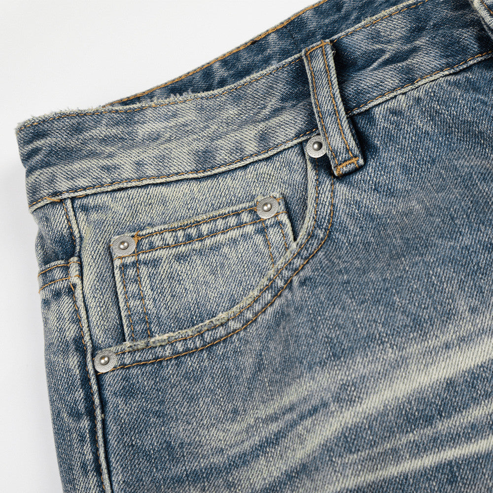 Micro-pantalon en jean délavé et déchiré