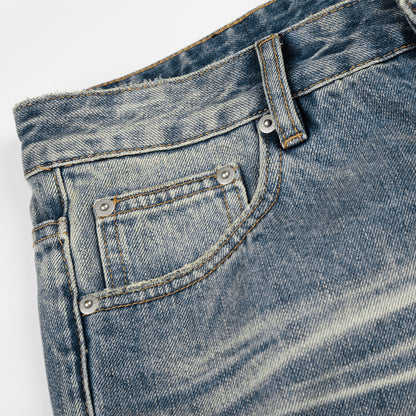 Micro-pantalon en jean délavé et déchiré