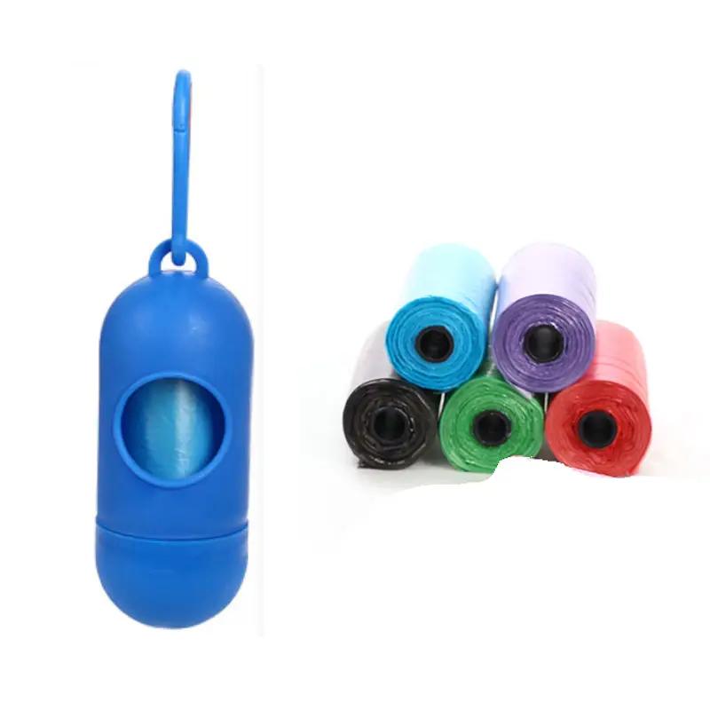 Dog poop bag dispenser by AdTec with six multicolor bag rolls
