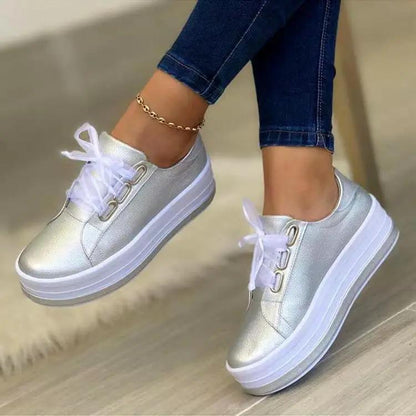 Women's lace-up platform sneakers by AdTec, metallic silver, round toe, white sole