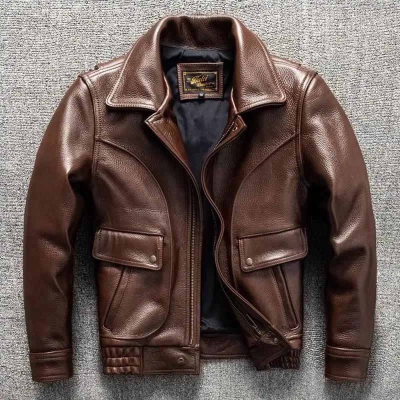 Leather jacket AdTec brown bomber with front zipper, multiple pockets, and ribbed cuffs and hem.