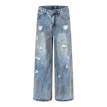 Pantalon en denim délavé, coupe droite oversize.