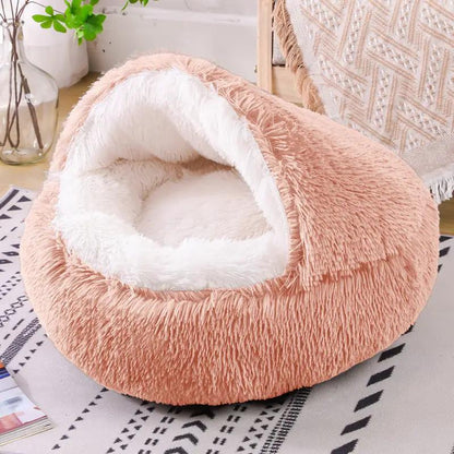 Deep Sleep plush round pet bed by AdTec, pink exterior with white fluffy interior